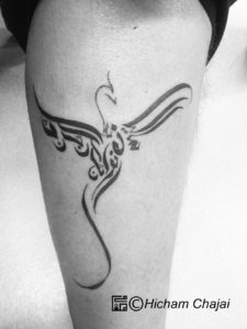 Phoenix - desenho de tatuagem árabe por Hicham Chajai com caligrafia árabe